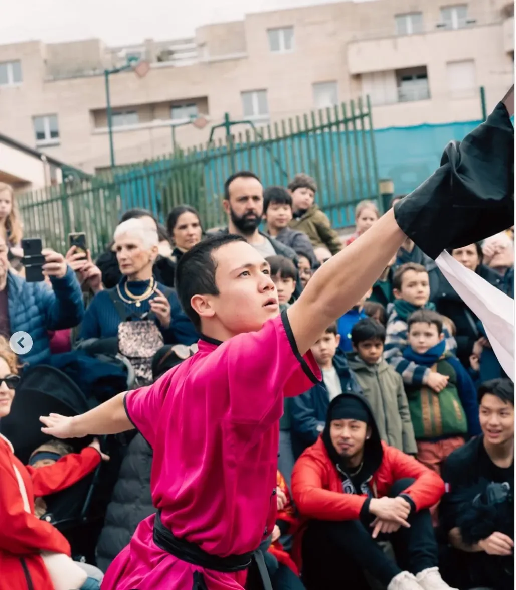 Pratiquant de kung-fu et public — Nouvel An chinois Paris 13